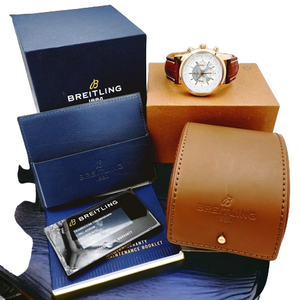 Men's Breitling 46mm Transocean Watch in 18K Rose Gold with Brown Leather Band.
